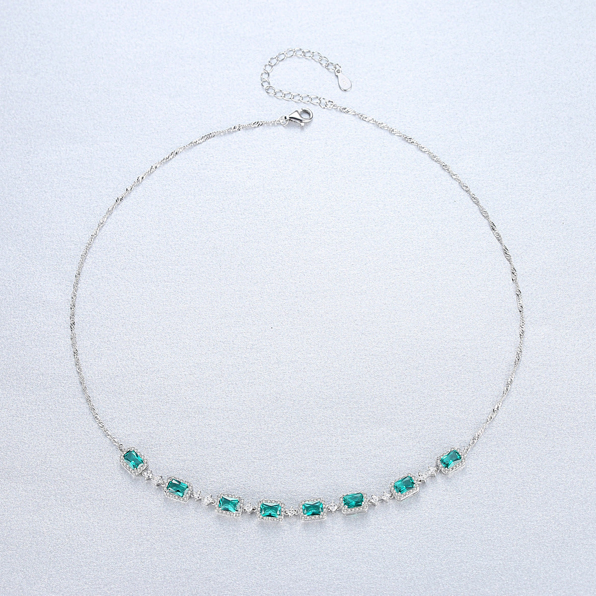 Gemstonely- S925 Silver Necklace Set with Wave Chain and  Imitation Emerald