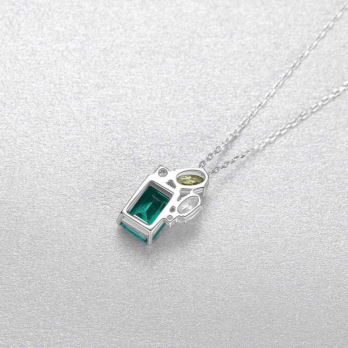 Gemstonely-S925 Sterling Silver Cross Necklace with Simulated Emerald Gemstone - Timeless Elegance and Distinctive Style for Women