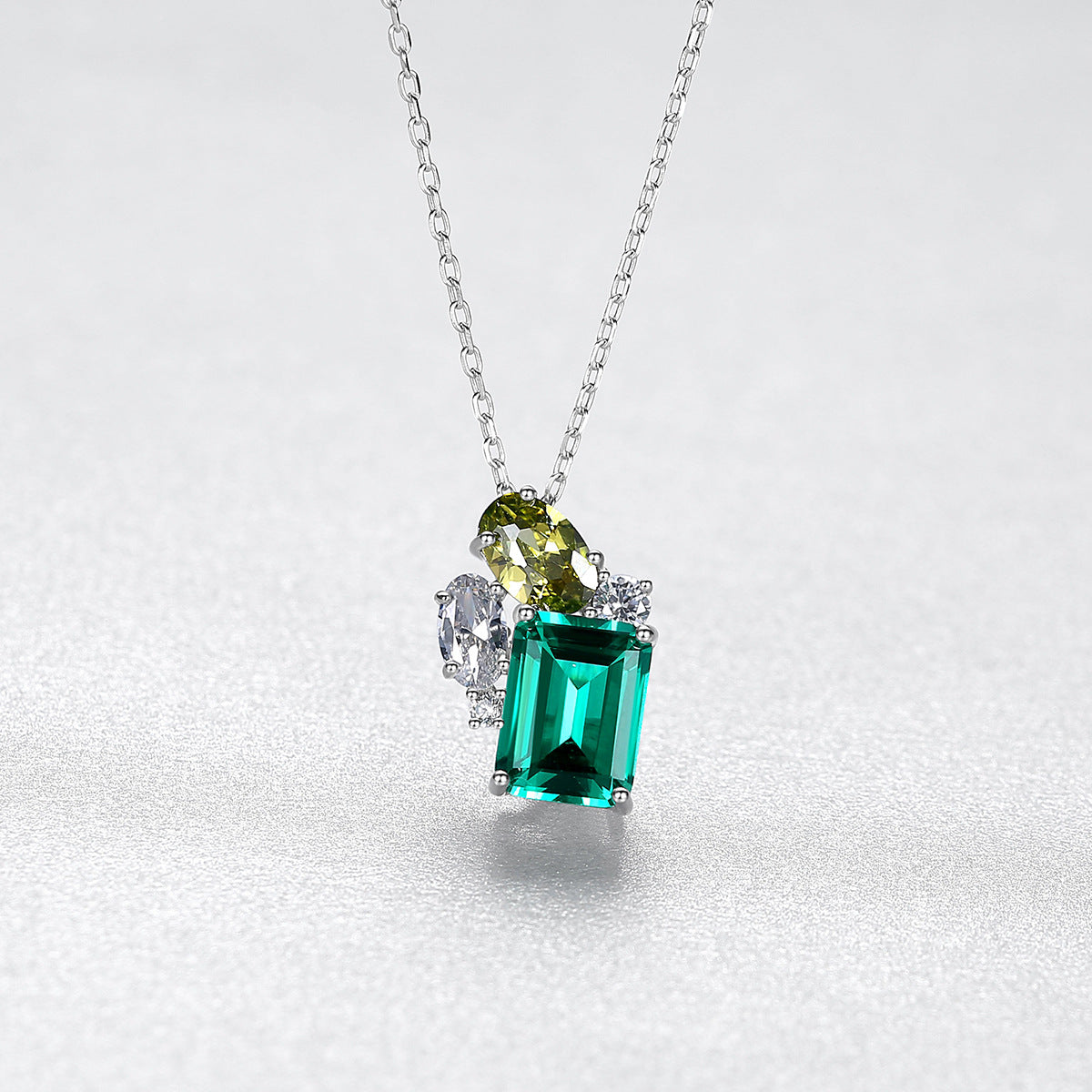 Gemstonely-S925 Sterling Silver Cross Necklace with Simulated Emerald Gemstone - Timeless Elegance and Distinctive Style for Women