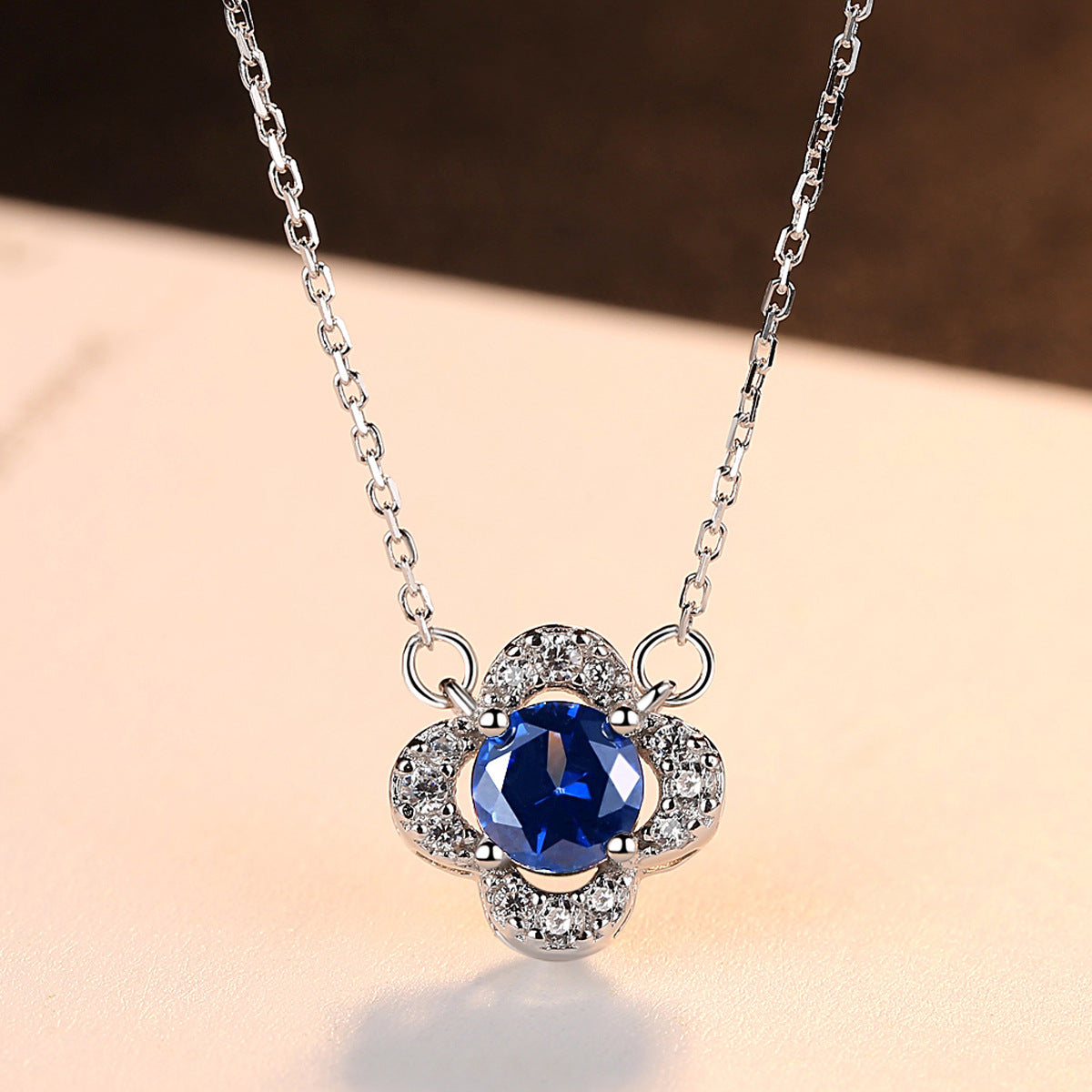 Gemstonely- S925 Silver Necklace with Created Sapphire Gemstone Pendant in Lucky Four-Leaf Clover Design for Women