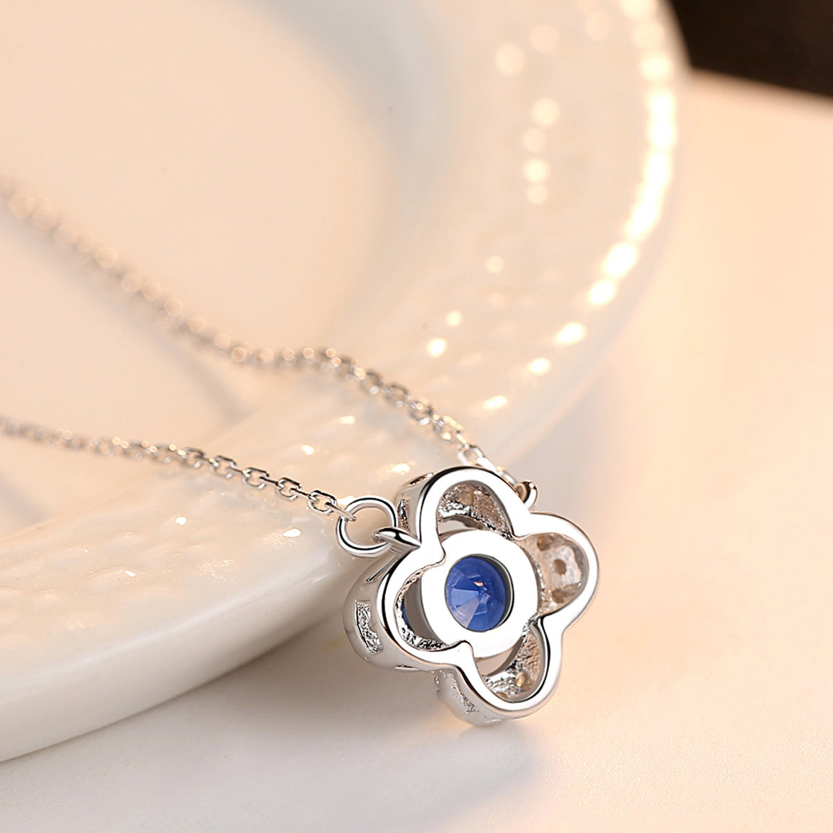 Gemstonely- S925 Silver Necklace with Created Sapphire Gemstone Pendant in Lucky Four-Leaf Clover Design for Women