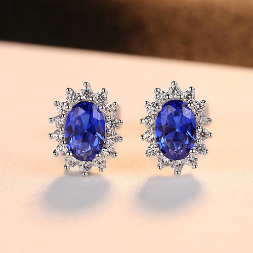 Gemstonely-925 Sterling Silver Floral Ear Studs with Synthetic Blue Sapphire - Duchess Inspired Earrings with Noble and Chic Aura